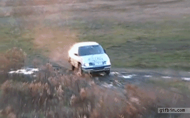 1320171504_car_jumps_over_big_screen_tv.gif