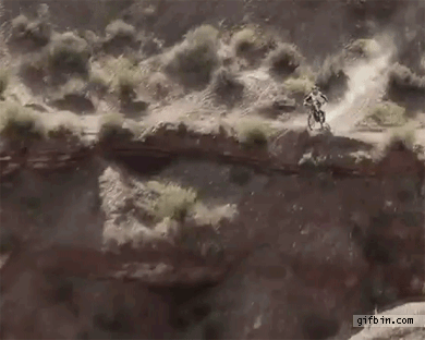 1321988179_insane_bike_backflip_off_a_cliff.gif