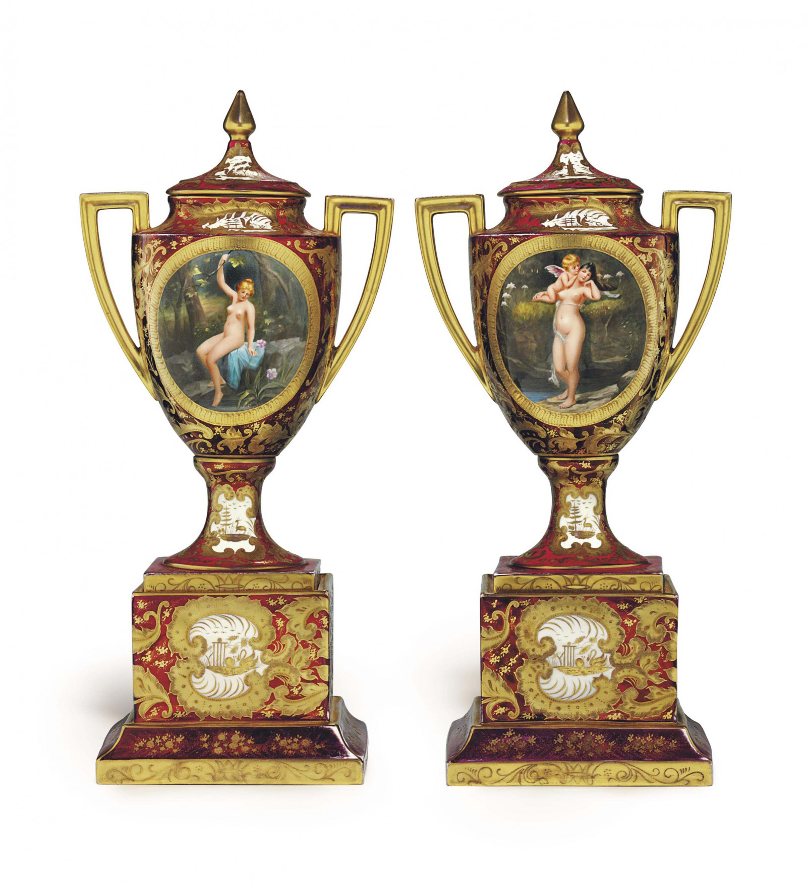 A PAIR OF VIENNA STYLE PORCELAIN CLARET-GROUND VASES AND COVERS ON FIXED STANDS, 'FLEURS DE EAU' AND 'LIEBESGEHEIMNISS'.jpg